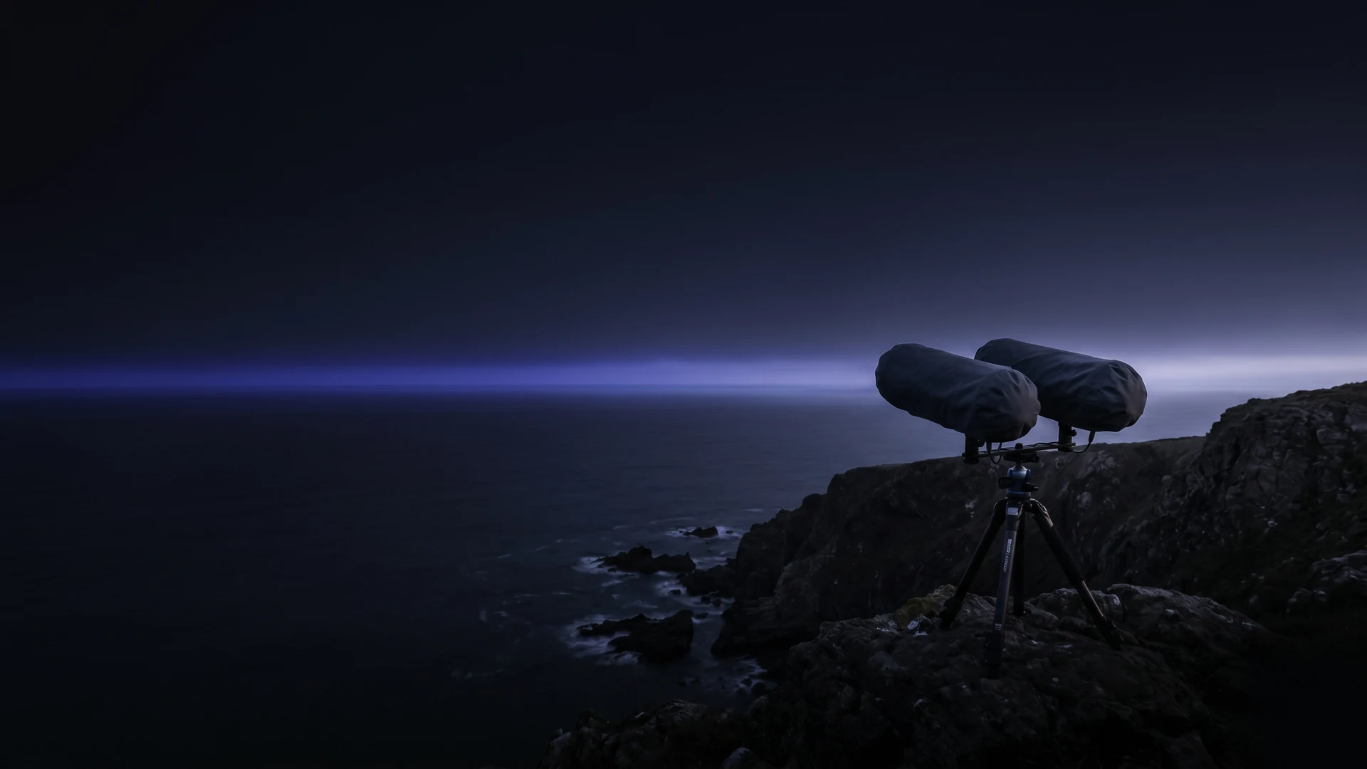 Bioacoustic recording rig deployed on a coastal headland at first light